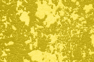 Concrete Yellow colorful wall surface texture. Abstract grunge bright illuminating color background with aging effect. Copyspace. Trendy color of the year 2021.