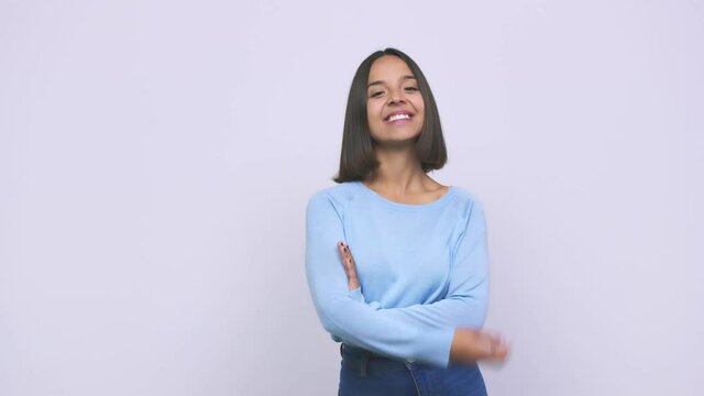 Young mixed race woman happy, smiling and cheerful