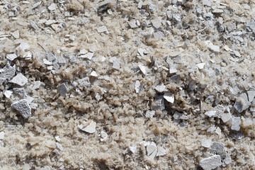 Texture of Dead Sea. Salty sea shore background. Salt accumulation on the Dead Sea shore in Jordan
