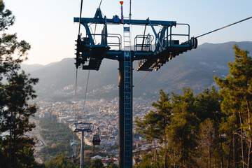 Riding cable car to view the city of Alanya (cleopatra beach), Turkey. Sunset time