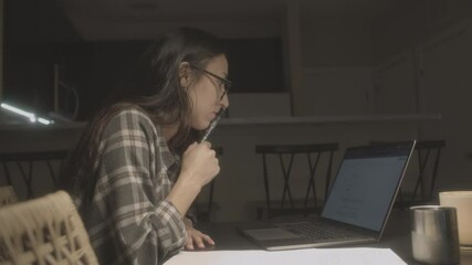 Woman is focusing and writing