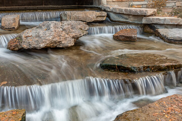 Fototapeta na wymiar Kelly Falls in Historic Arkansas Riverwalk in Pueblo, Colorado