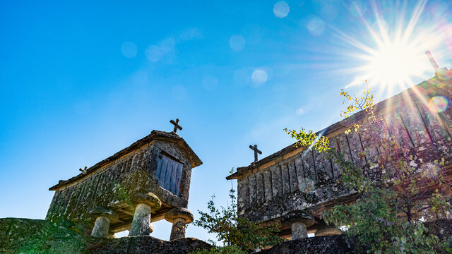Horreos. Elevated stone granaries, on a hill in the north of Portugal