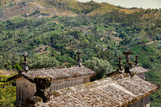 Horreos. Elevated stone granaries, on a hill in the north of Portugal