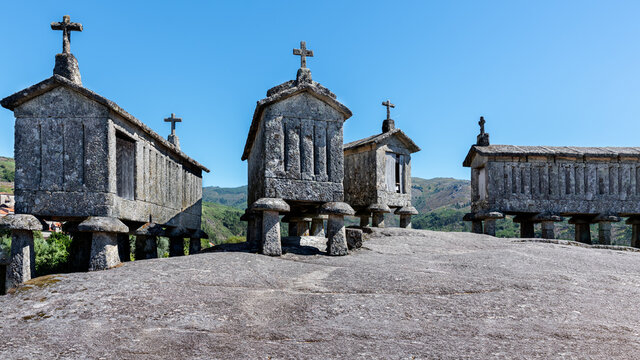 Horreos. Elevated stone granaries, on a hill in the north of Portugal