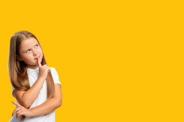 Curious kid. Commercial background. Special offer. Portrait of pensive unsure young girl thinking...