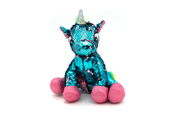 Unicorn plush toy. Isolated on white background 
