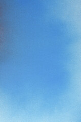 blue spray paint on blue background