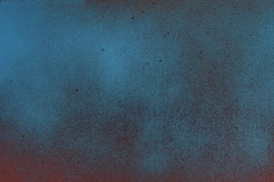 spray paint blue over red spray background