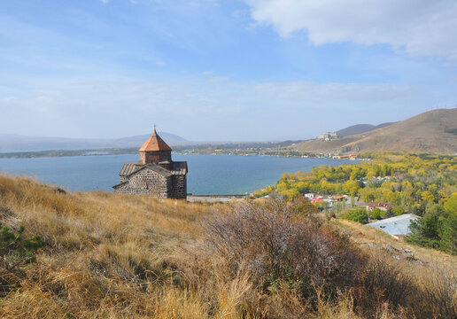Church of St. Karapet of Sevanavank monastery on the background of Lake Sevan. Armenia