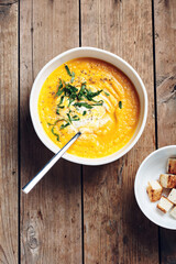 Pumpkin cream soup with croutons.