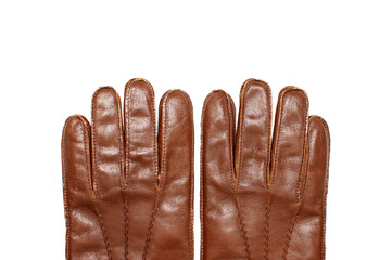 Brown classic leather men's gloves on white isolated background top view. Stylish Fashionable winter autumn spring clothing accessory. Genuine leather gloves. Stylish wardrobe item