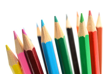 A set of colored pencils on white background