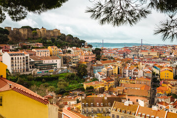 Fototapeta na wymiar capital city of Portugal Lisbon Lisboa white building with orange red roofs view over the city