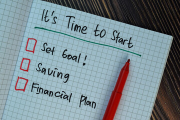 It's Time to Start write on a book isolated on Wooden Table. Suported by additional service.