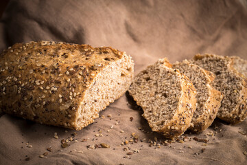 Slices of seeded wheat bread.