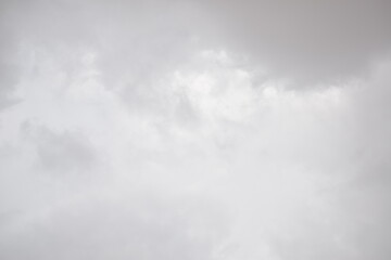 Obraz premium Blue sky with puffy white clouds.