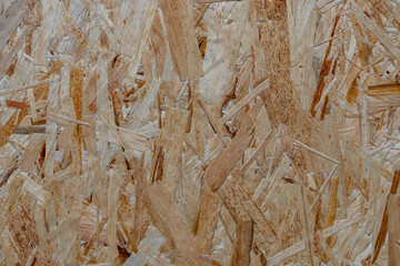 close up pressed wooden panel background - OSB wood
