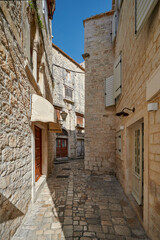 Beautiful city of Trogir, Croatia, narrow streets of the old town	
