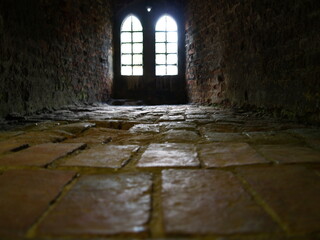 Obraz premium Light through Eeire castle windows 