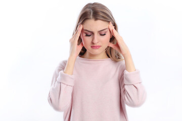 Young caucasian woman  suffers from headache
