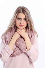 Young woman suffers from sore throat