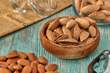Almond kernels lie on a dark background.Selective focus.Salted almonds.