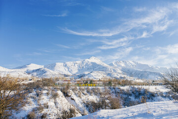 Fototapeta na wymiar The village of Chimgan in Uzbekistan in winter. Tien Shan mountain system