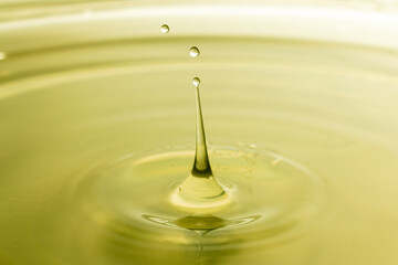 water drop on yellow
