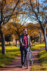 Man with bicycle at the park