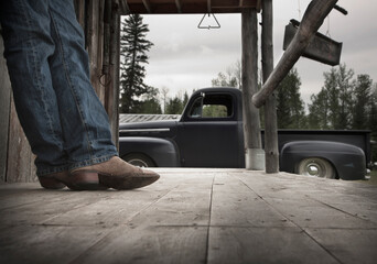 Cowboy boots and old truck