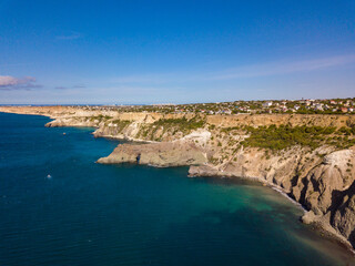 Aerial view to beautiful sea coast with turquoise water and rocks in Fiolent Cape, Crimea.
