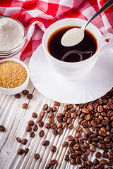 cup of fragrant fresh coffee on a white wooden rustic background
