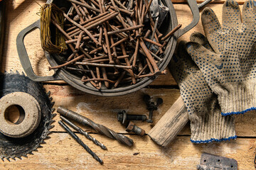 Old vintage household hand tools still life on a wooden background in a DIY and repair concept