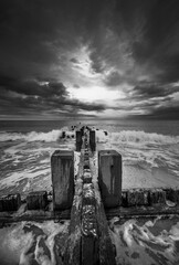 Mundesley beach with dramatic clouds and overcast