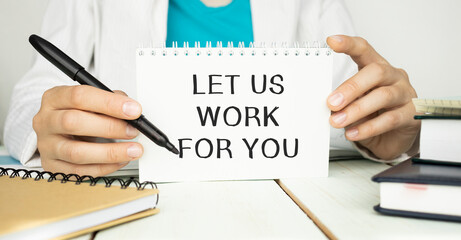 Businessman presenting 'Let us work for you'' word on white card