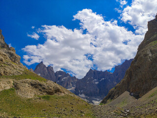 mountains and blue sky, white clouds, natural landscape	

