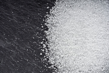 citric acid on a dark stone background