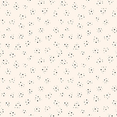 Abstract dots seamless pattern. Vector minimalist monochrome background. Simple minimal texture with small dots, random spots, points, circles. Subtle black and white repeat design for decor, print