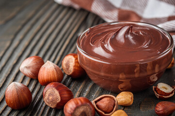 toasts with chocolate butter on a dark wooden rustic background