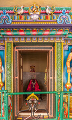Kadirampura, Karnataka, India - November 4, 2013: Sri Murugan Temple. Niche shrine with colorful decorations with statue of Goddess Saraswati.