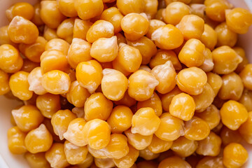 boiled chickpeas on a white wooden rustic background