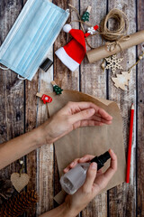 Obraz na płótnie Canvas letter to santa claus, christmas wishlist on wooden background among holiday