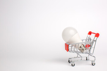 LED light bulbs on a cart, Isolated on white background. The concept of selling and buying business...