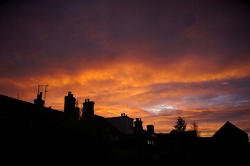 Orange cloud sunset over the rooftops