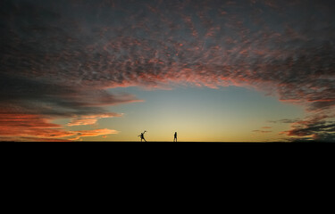 People standing on a dune at Cape Range National Park, Exmouth, Coral Bay, Western Australia