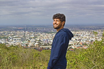 man standing on the hill