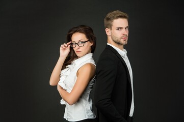 Entrepreneurship activities for individuals. Business couple dark background. Sexy woman and handsome man in formalwear. Business relationship. Job and work. Profession and occupation