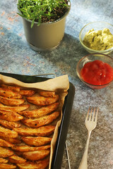 A tray with potatoes backed in oven