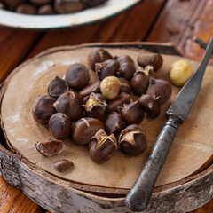 Roasted Chestnuts on Wooden Board